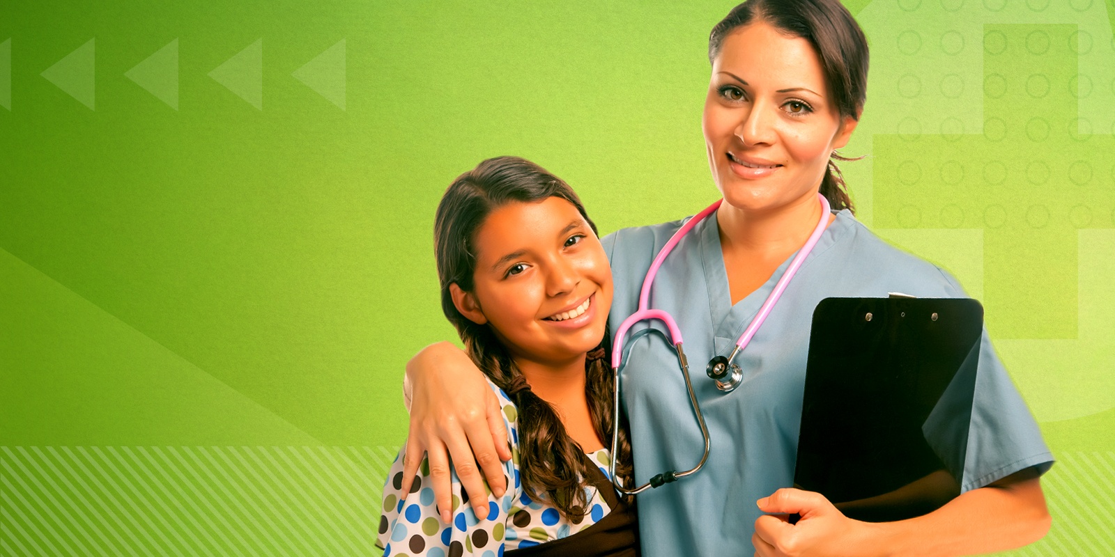 nurse holding tablet with other arm around young female patient