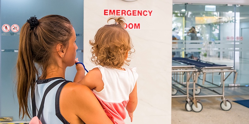 Mom and daughter walking in to Emergency Room