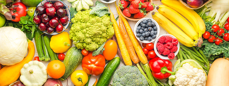 Healthy fruits vegetables berries background, cherries peaches strawberries cabbage broccoli cauliflower squash tomatoes carrots bananas beans beetroot, pepper, top view