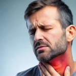 Man holding his throat with visible neck pain.