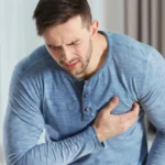 Man experiencing chest pain from pericarditis